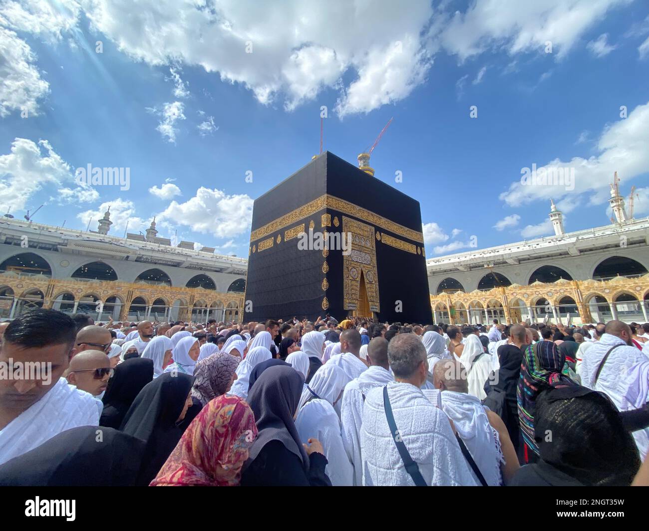 Muslim Pilgrims at The Kaaba in The Haram Mosque of Mecca , Saudi