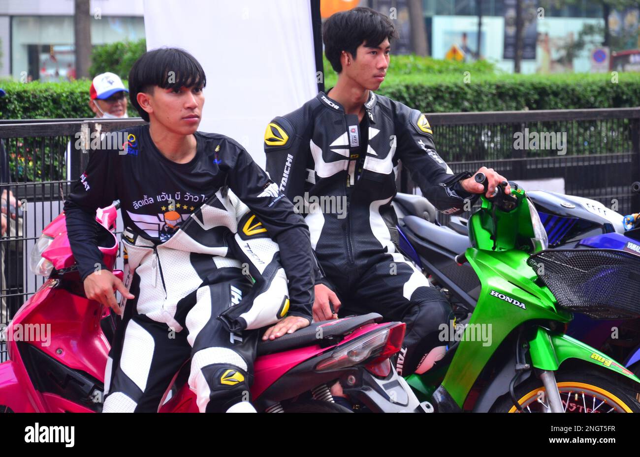 Young men take part in a motorcycling event, organised by Thailand's National Sports Development Fund (NSDF), at Central World shopping mall, Bangkok, Thailand, Asia on 19th February, 2023. Young male motorcyclists display safe use of a motorbike. Thailand's roads have the most  deaths in Southeast Asia with the ninth greatest rate of road fatalities in the world at 32.7 per 100,000 people each year, says the World Health Organization. Some 20,000 people die on Thailand's roads each year. Stock Photo