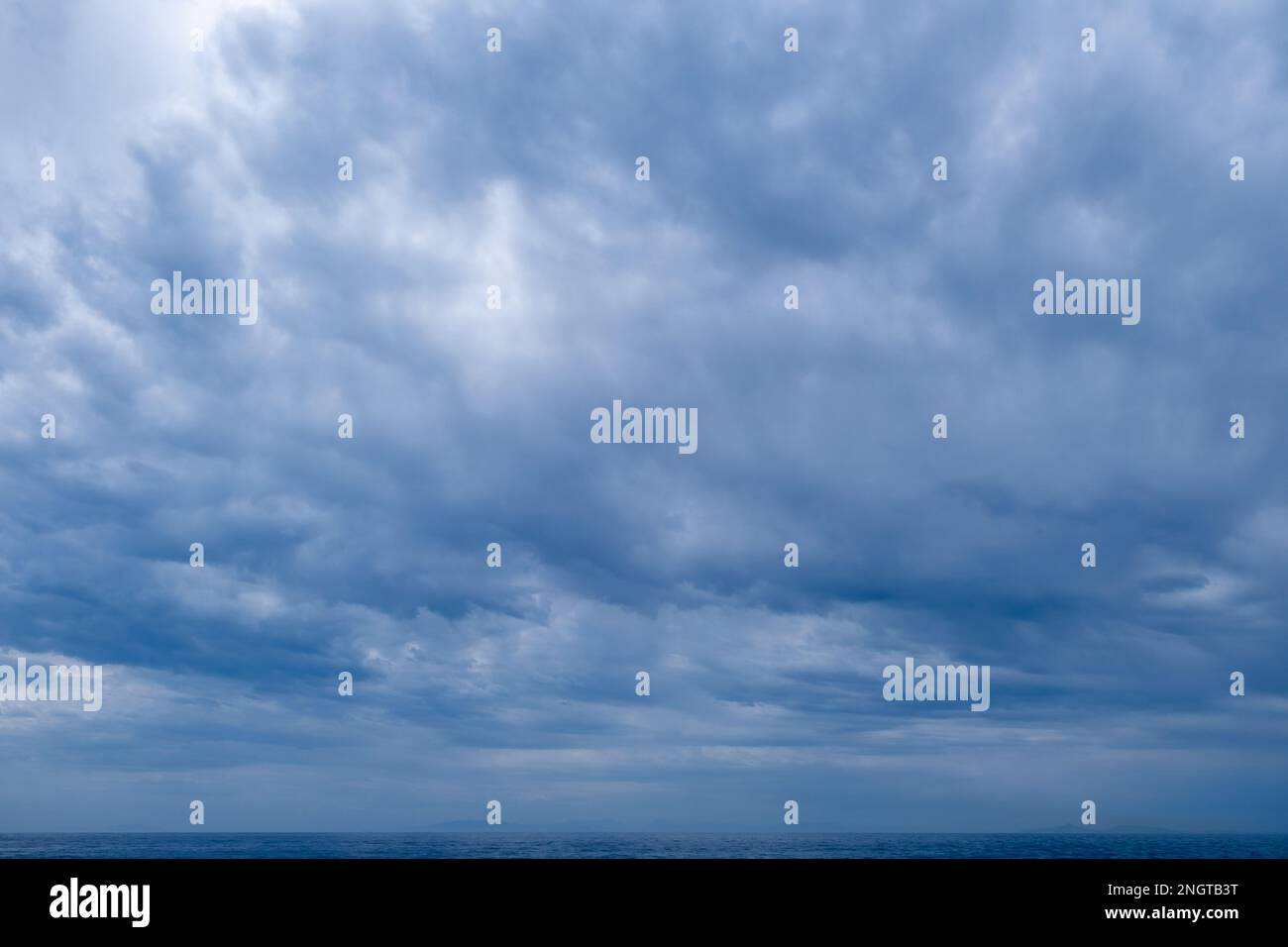 Blue sky background with clouds, Natural sky background with tiny clouds. Stock Photo