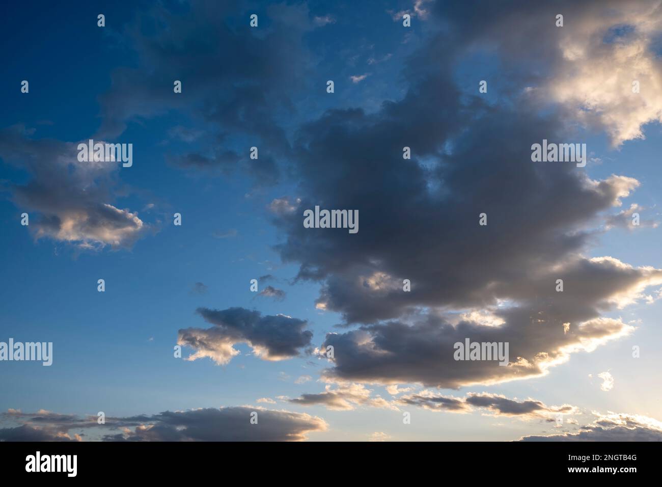 Blue sky background with clouds, Natural sky background with tiny clouds. Stock Photo
