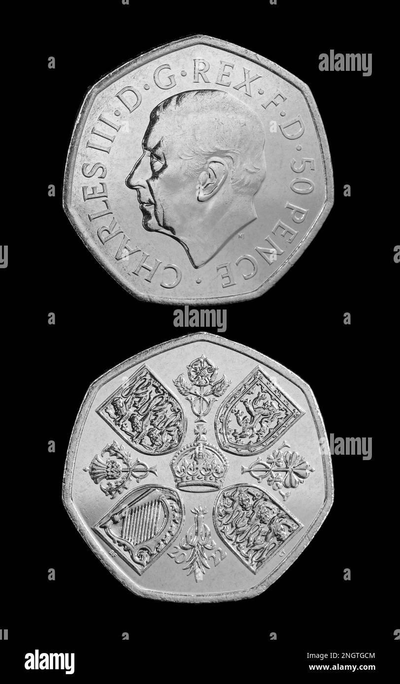 The new 50 pence coin featuring the first coin portrait of King Charles III by Martin Jennings. The reverse side features the 1953 Coronation Crown Stock Photo