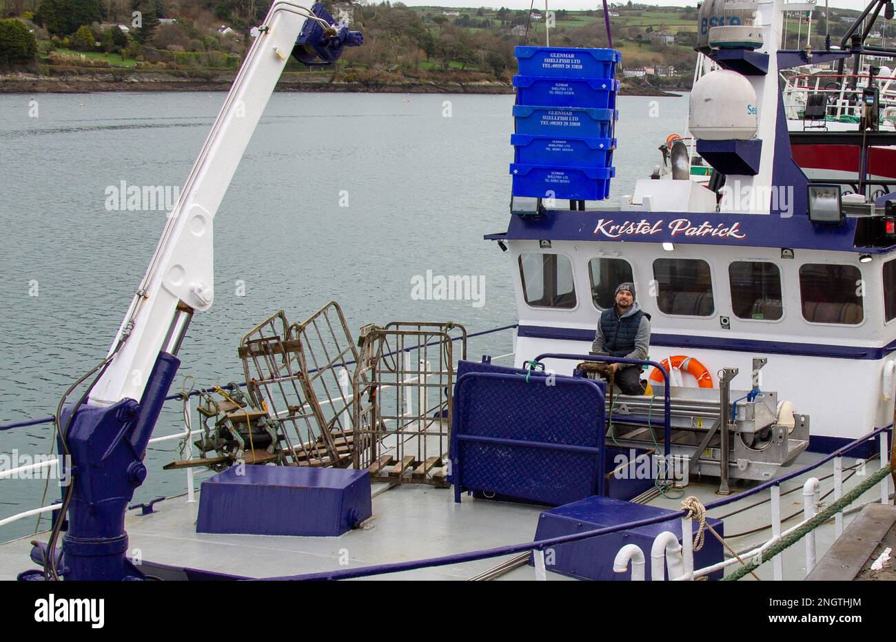 Fishermen landing catch from Trawler. Stock Photo