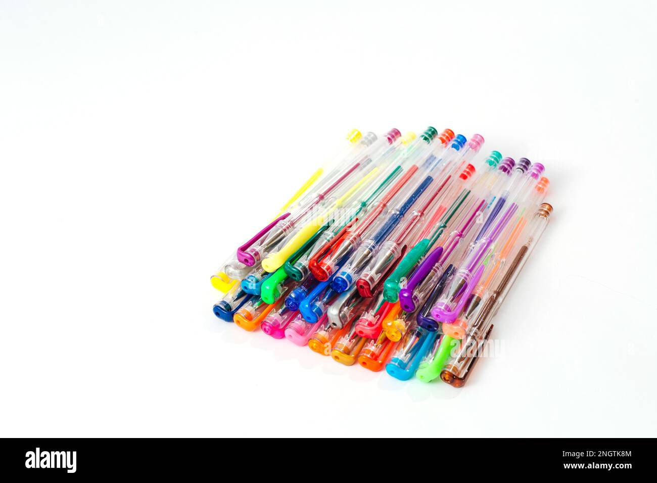 Multi-colored gel pens on a white isolated background. Isolated Stock Photo