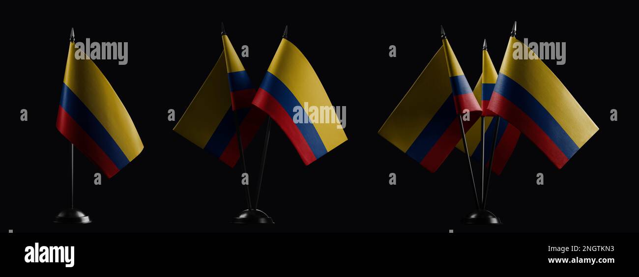 Small national flags of the Colombia on a black background. Stock Photo