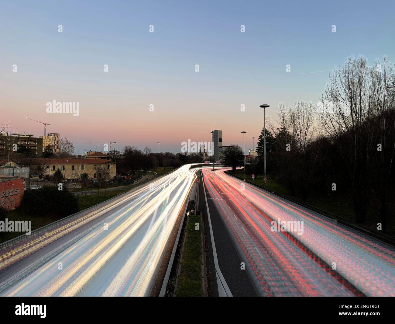 a fantastic image of Milan's motorway at sunset Stock Photo