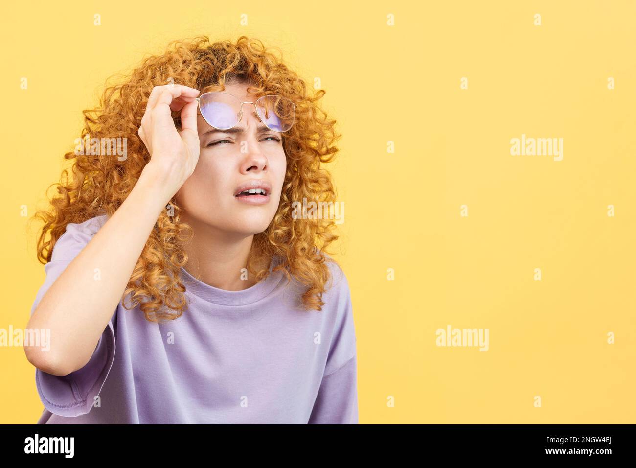 Woman curly hair glasses hi-res stock photography and images - Alamy