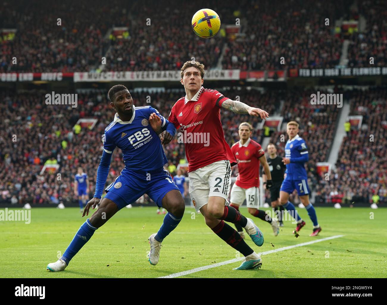 Leicester City's Kelechi Iheanacho (left) and Manchester United's Victor Lindelof battle for the ball during the Premier League match at Old Trafford Stadium, Manchester. Picture date: Sunday February 19, 2023. Stock Photo