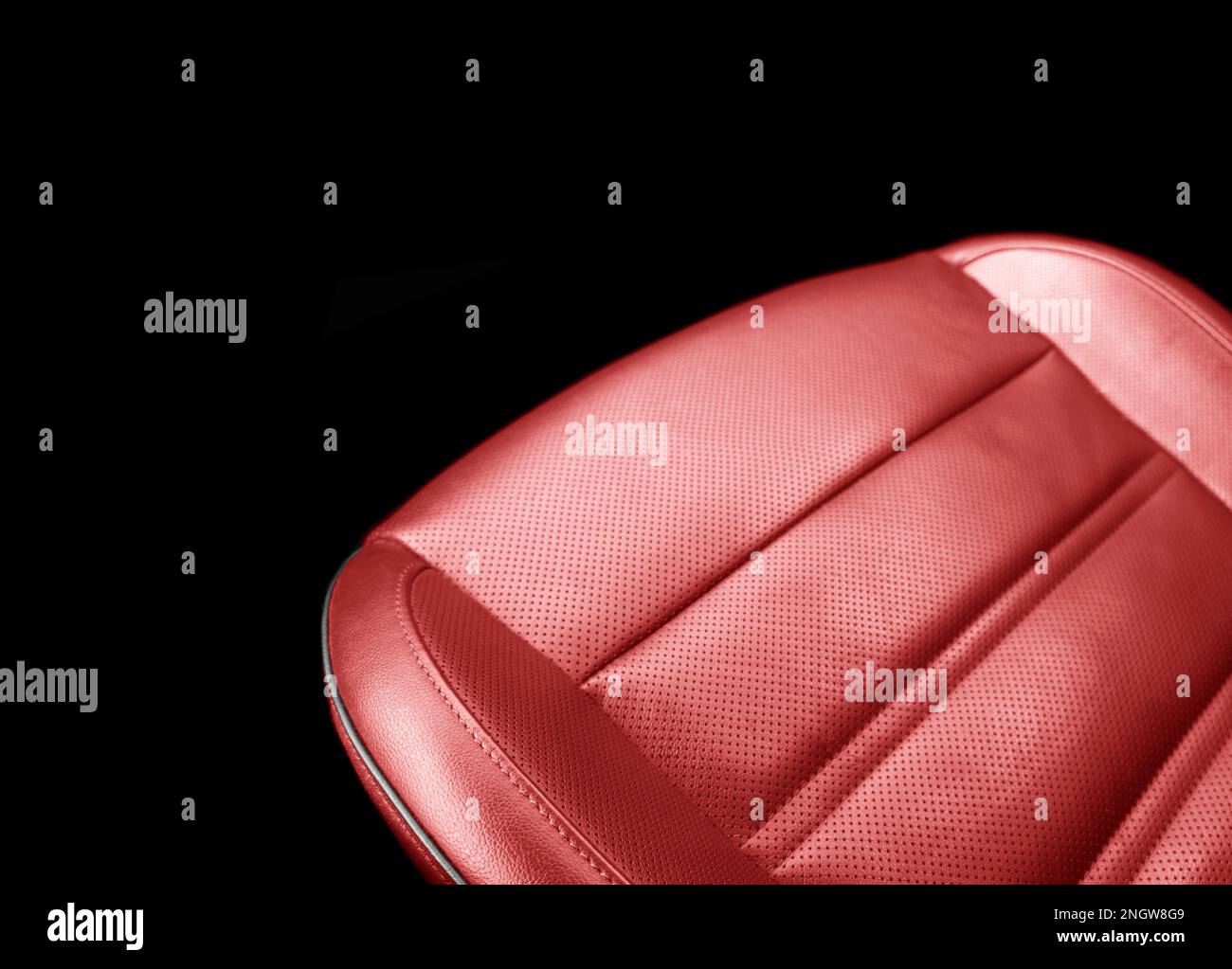 Modern luxury red leather interior. Part of red leather car seat