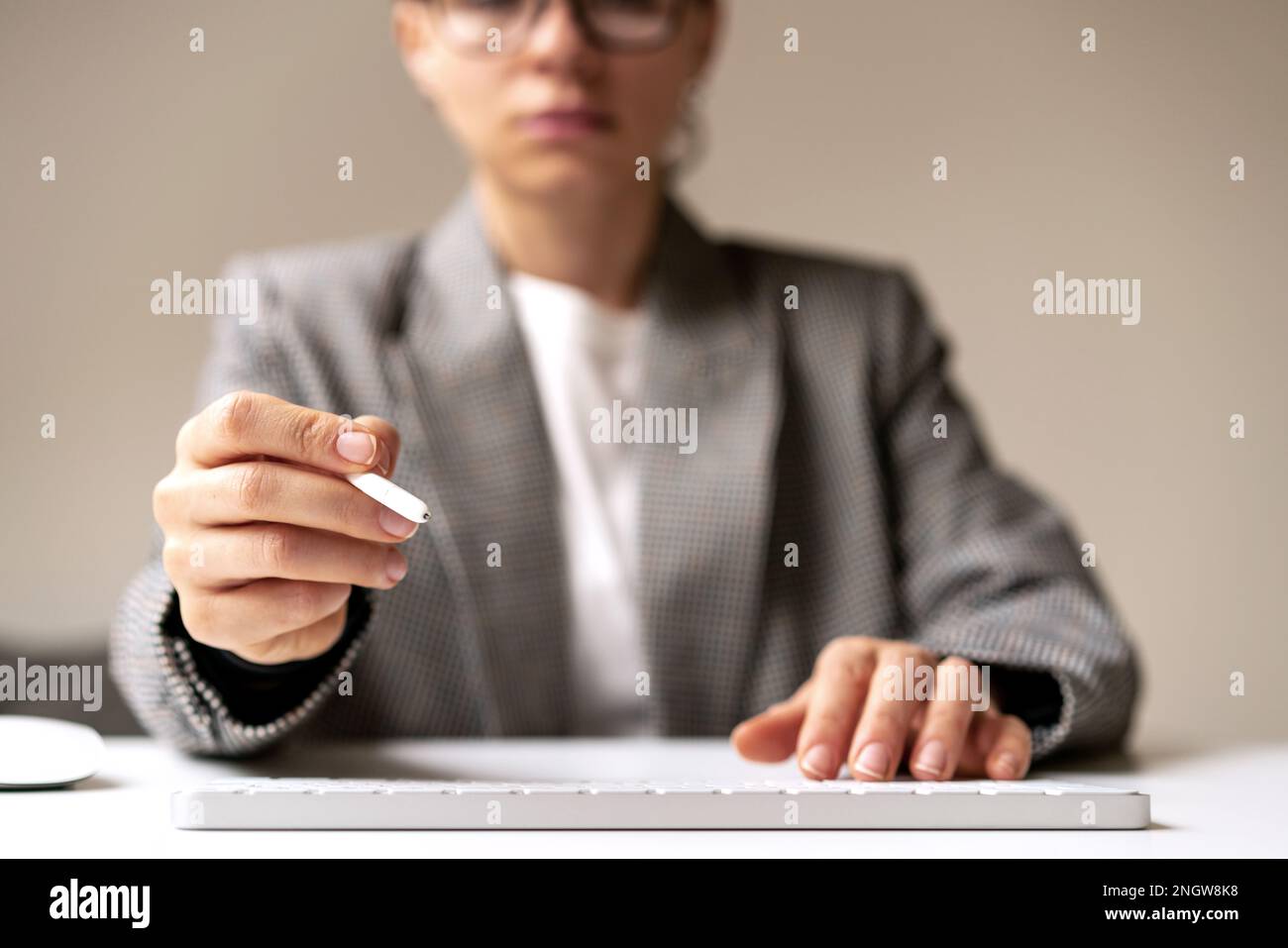 Female business person signing virtual contract using digital pen stylus, space for photomontage insert infographic. Stock Photo