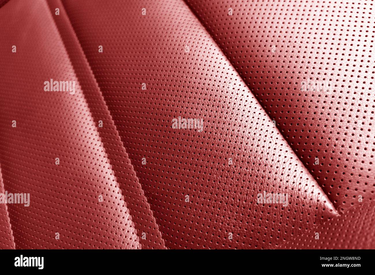Red leather interior. Part of red leather car seat details with