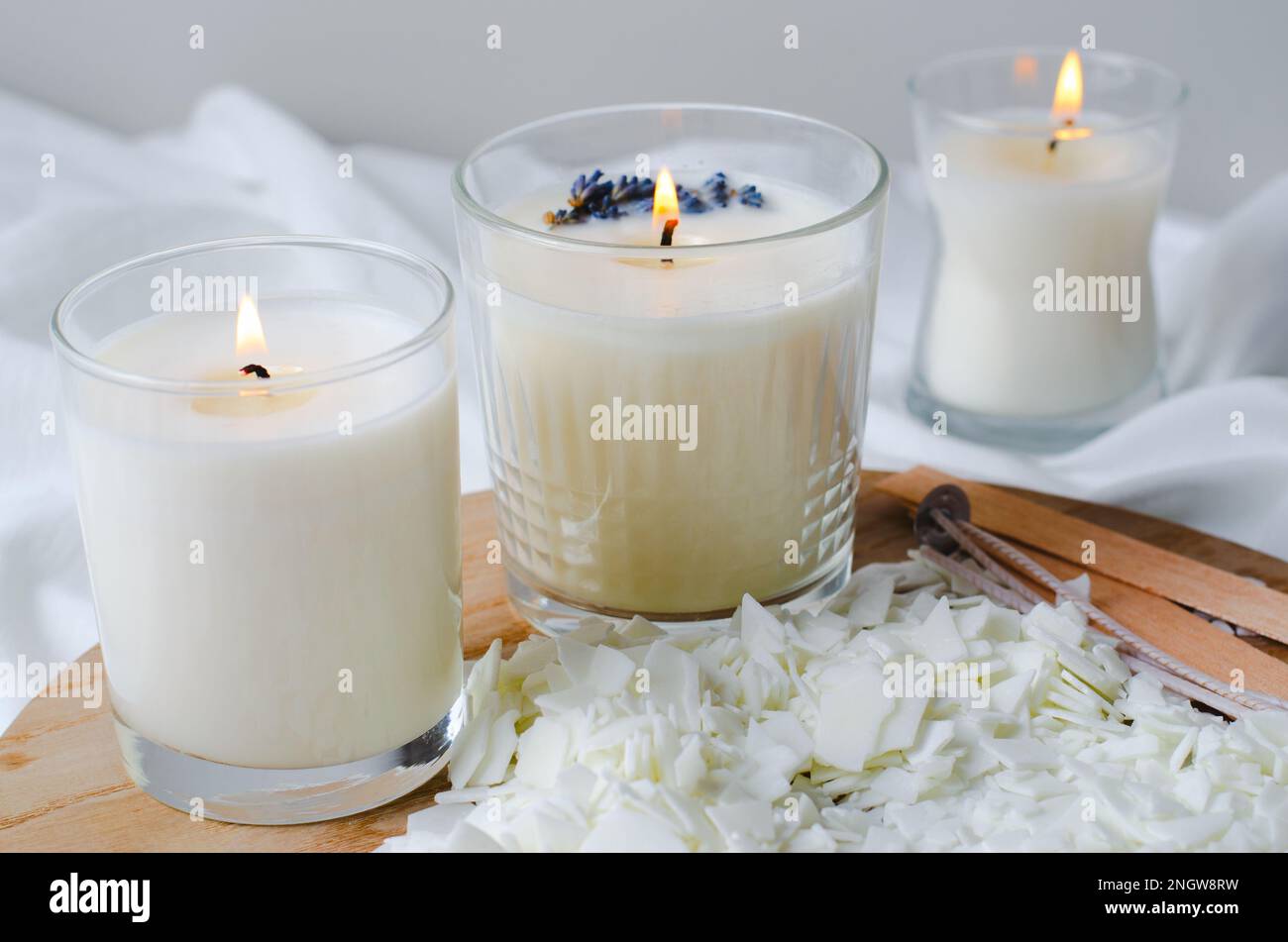 White soy wax flakes for candle making on a light gray marble background  Stock Photo - Alamy