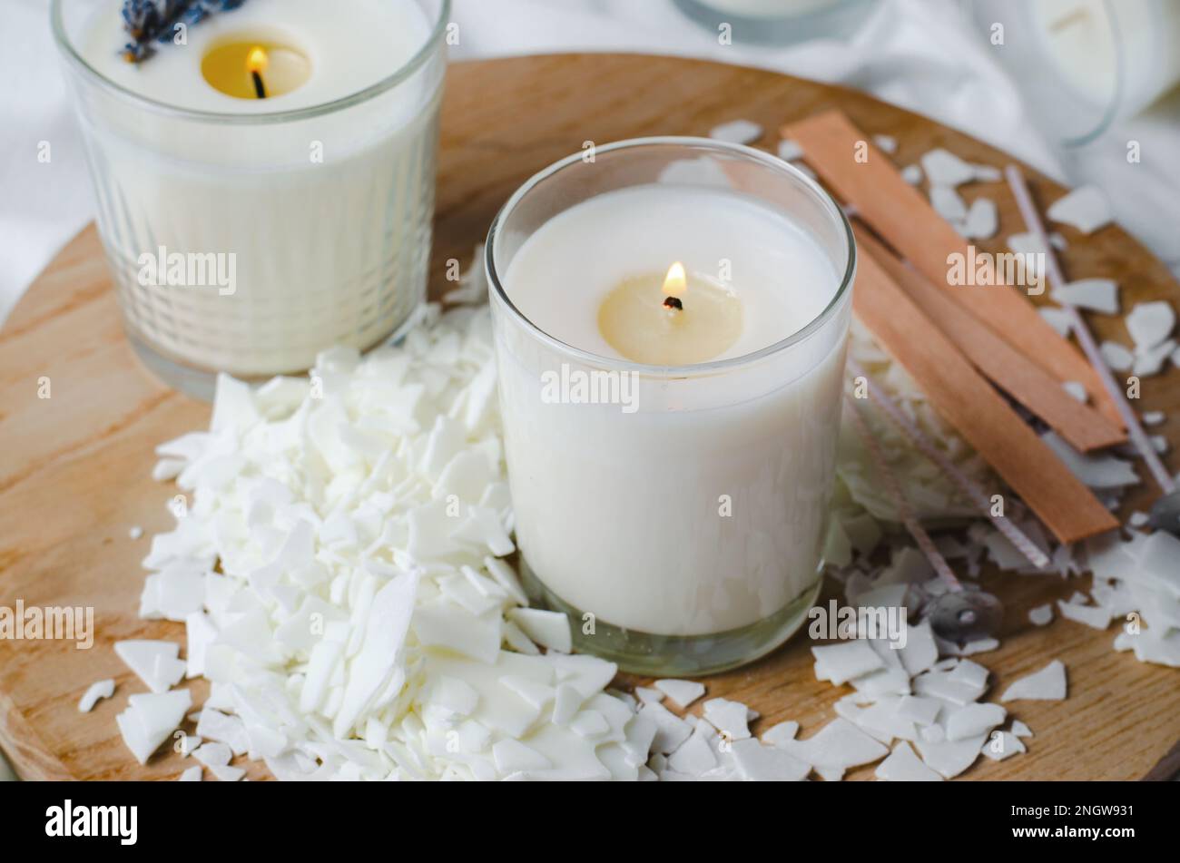 Close up of white soy wax flakes for candle making. Light texture of soy  wax flakes. Ingredient for homemade candles. Ecological lifestyle Stock  Photo