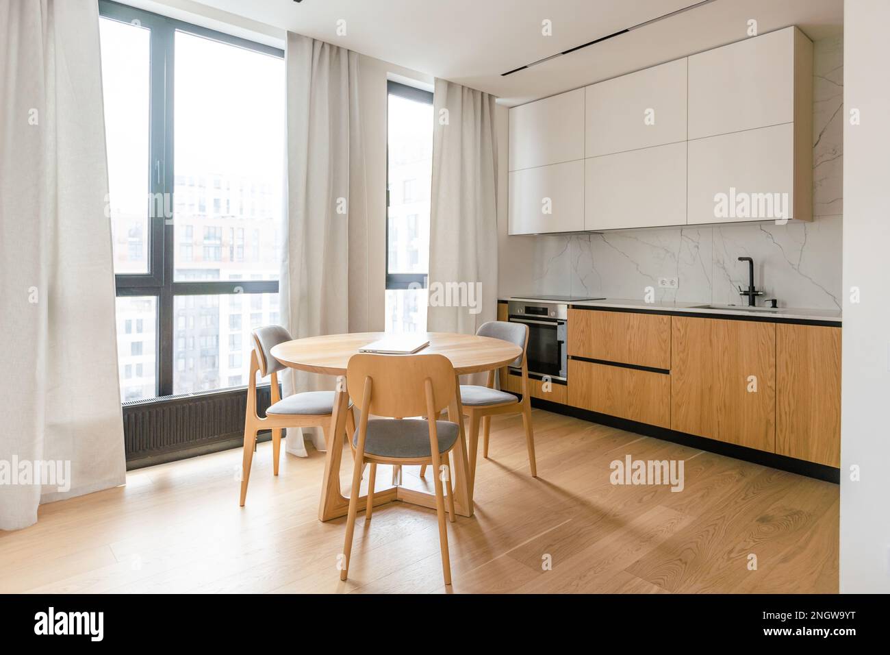View of Beautiful Modern Kitchen in a Luxury Apartment Stock Photo - Alamy