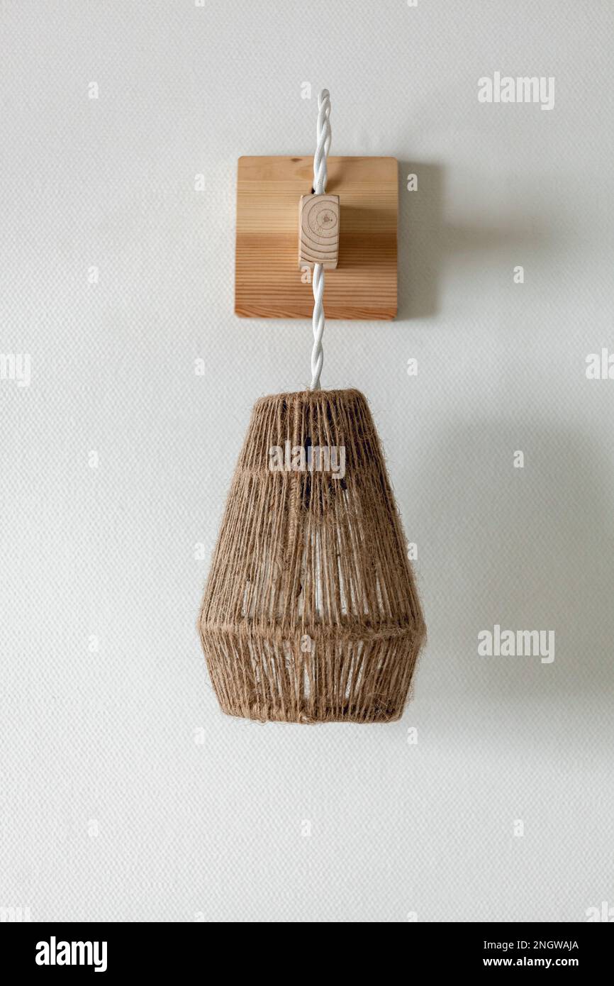 Jute rope light lamp fixture with wood wall mount Stock Photo Alamy