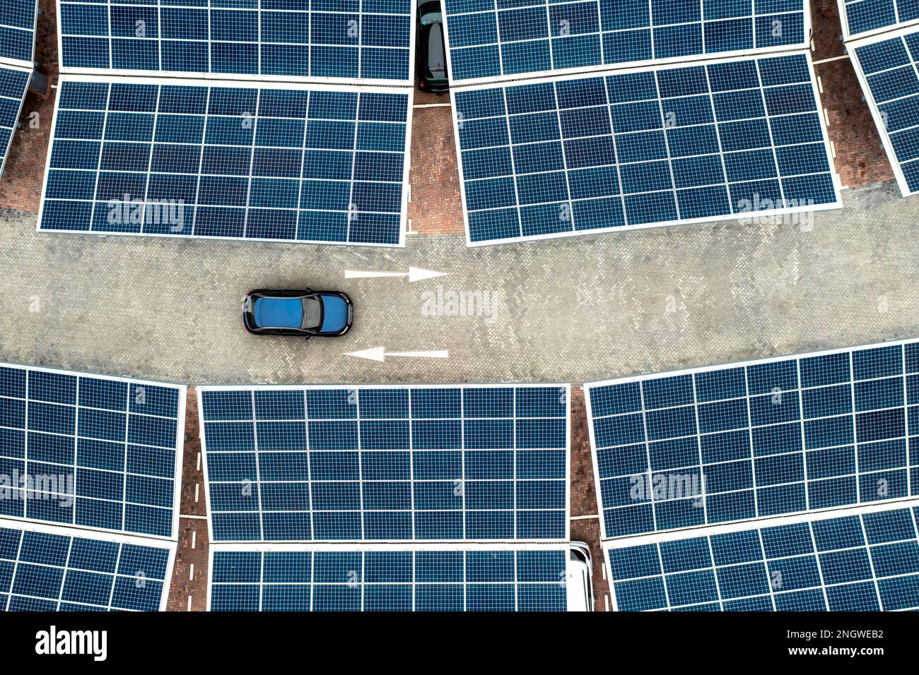 Aerial view directly above a self sufficient parking lot with solar