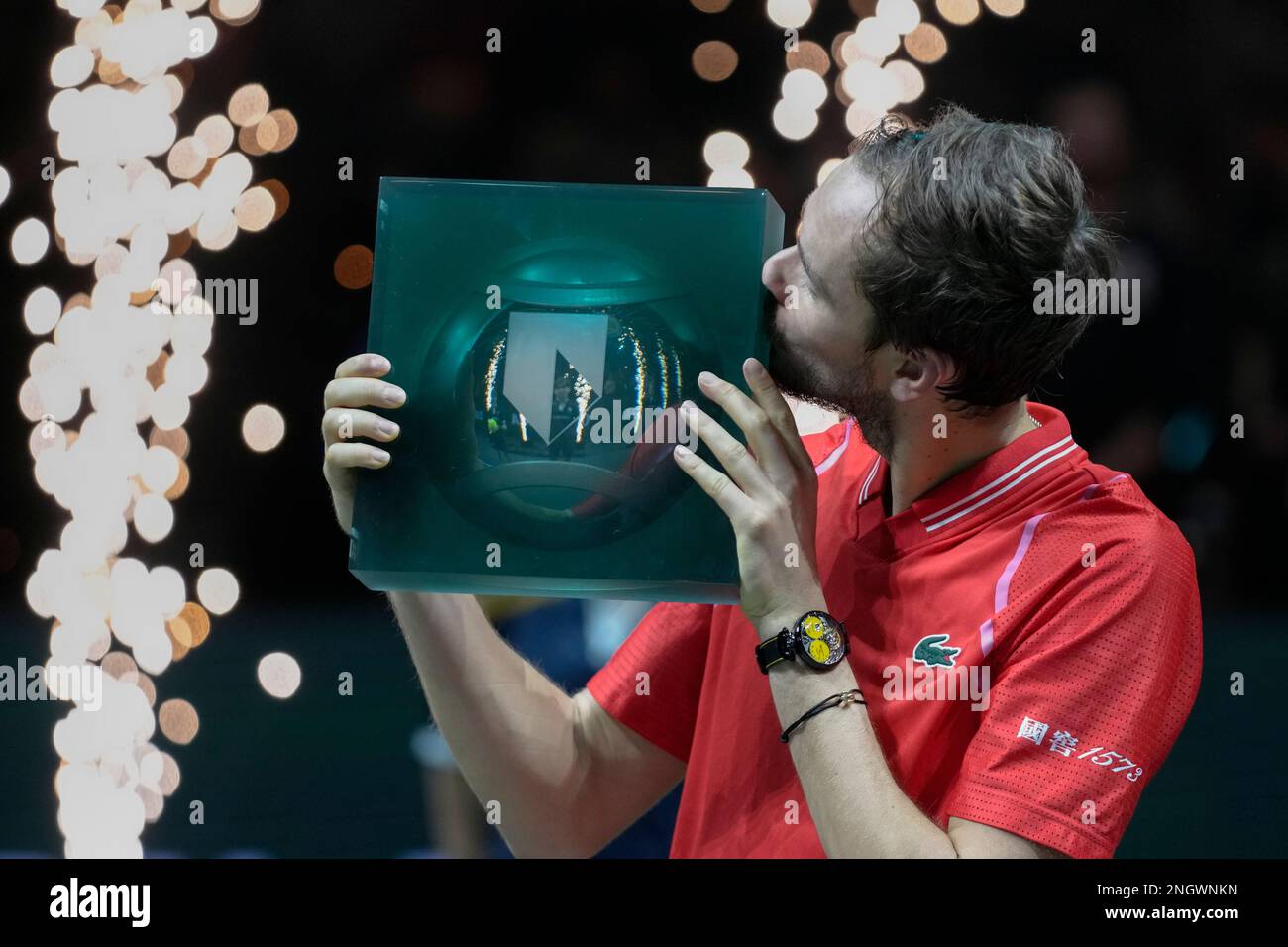 Russia's Daniil Medvedev kisses the trophy after winning the men's