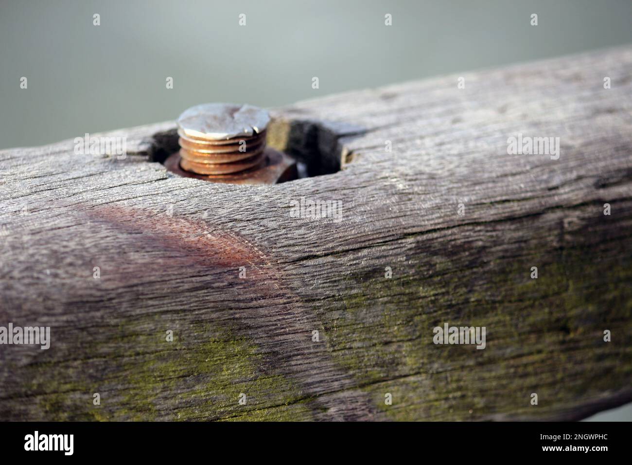 At the dock, time leaves marks on the wood. Ropes, nails and screws leave marks in the wood. Stock Photo