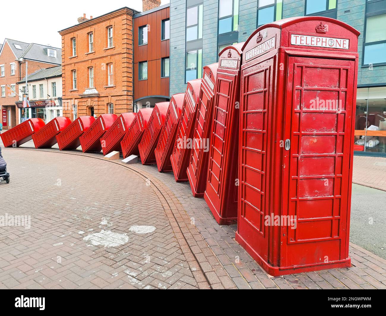 Line of red call boxes on the street of London UK. High quality photo