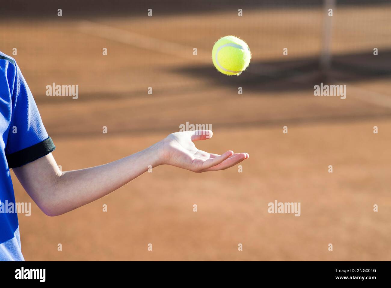 kid playing with tennis ball Stock Photo Alamy