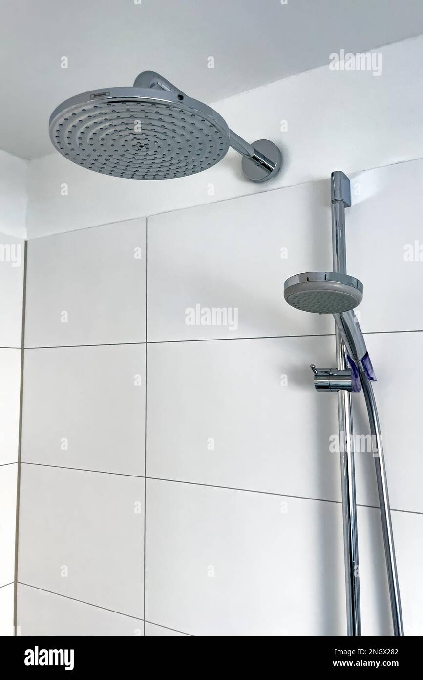 Shower with two shower heads left large shower head type rain shower