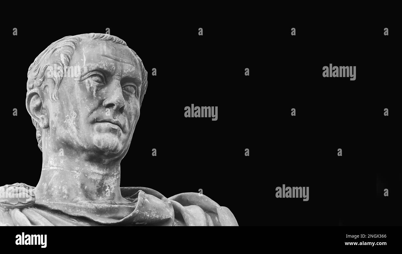 Julius Caesar, the most famous general and leader of Ancient Rome. An old bronze statue replica along Imperial Fora Rome in Rome (Black and White with Stock Photo