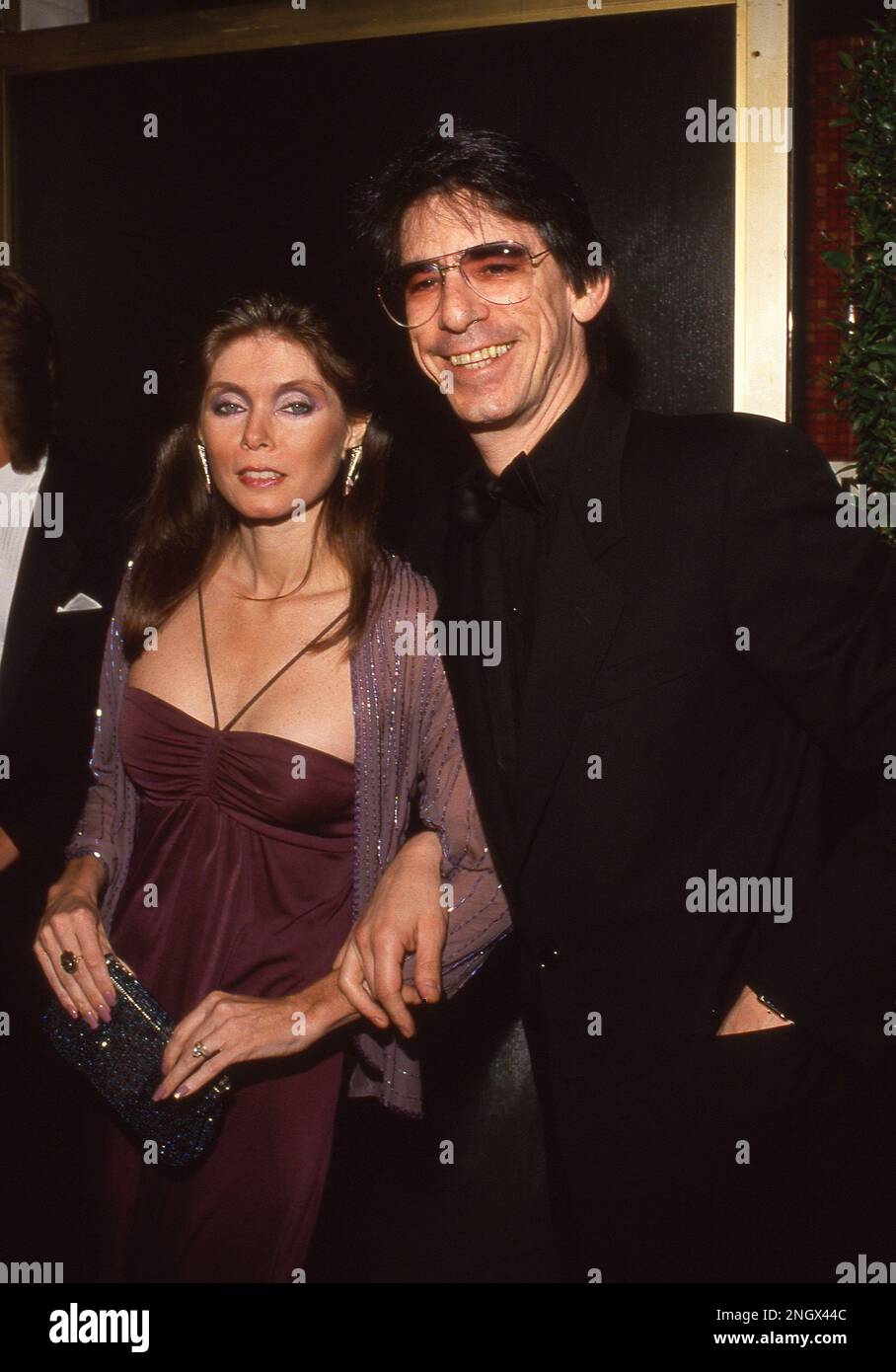 **FILE PHOTO** Richard Belzer Has assed Away. Harlee McBride & Richard Belzer during 1988 American Comedy Awards in Los Angeles, California May 17, 1988 Credit: Ralph Dominguez/MediaPunch Stock Photo