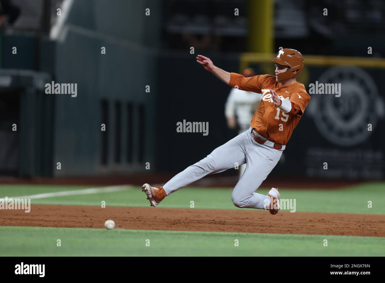 February 18, 2023: Longhorn base runner Mitchell Daly #19 slides into third base. Missouri defeated Texas 6-5 in Arlington, TX, Richey Miller/CSM Stock Photo