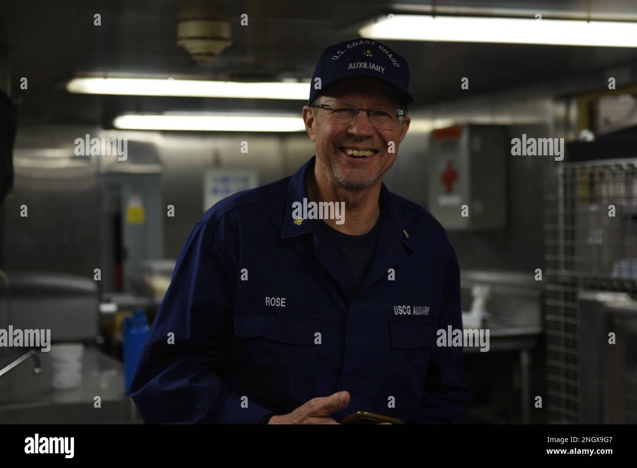 u-s-coast-guard-auxiliarist-john-rose-poses-for-a-photo-in-the-galley