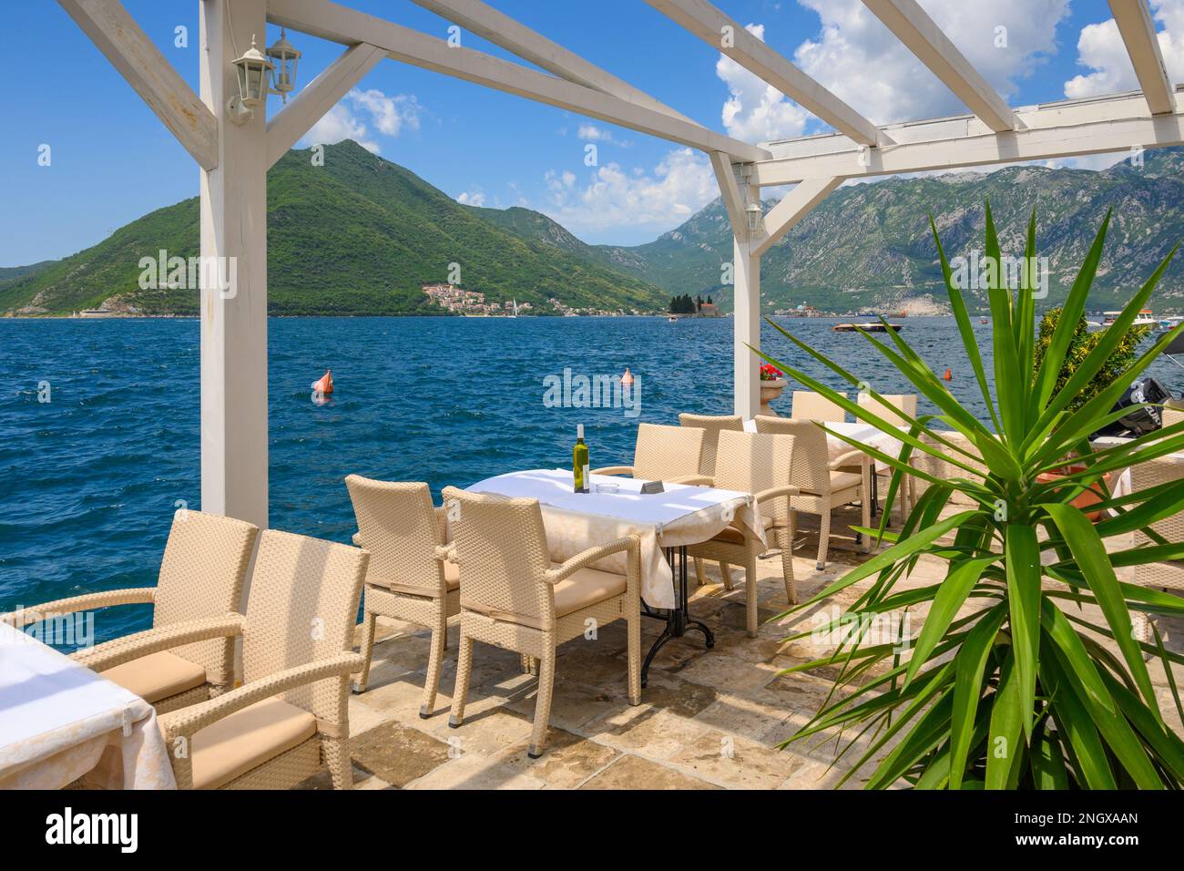 Perast, Montenegro - June 6, 2022: Seaside restaurant cafe in the picturesque town of Perast in Montenegro Stock Photo