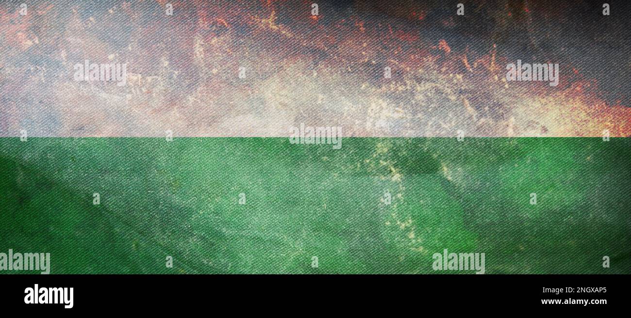 retro flag of Indo Aryan peoples Garhwali people with grunge texture. flag representing ethnic group or culture, regional authorities. no flagpole. Pl Stock Photo