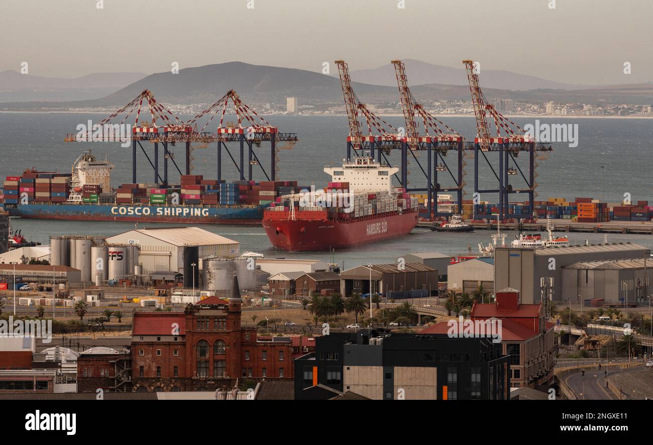 Cape Town South Africa. 2023. Container ship berthing alongside the container terminal with assistance from tugs. Stock Photo