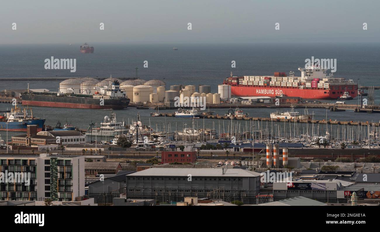 Cape Town South Africa. 2023. Container ship berthing alongside the container terminal with assistance from tugs. Stock Photo