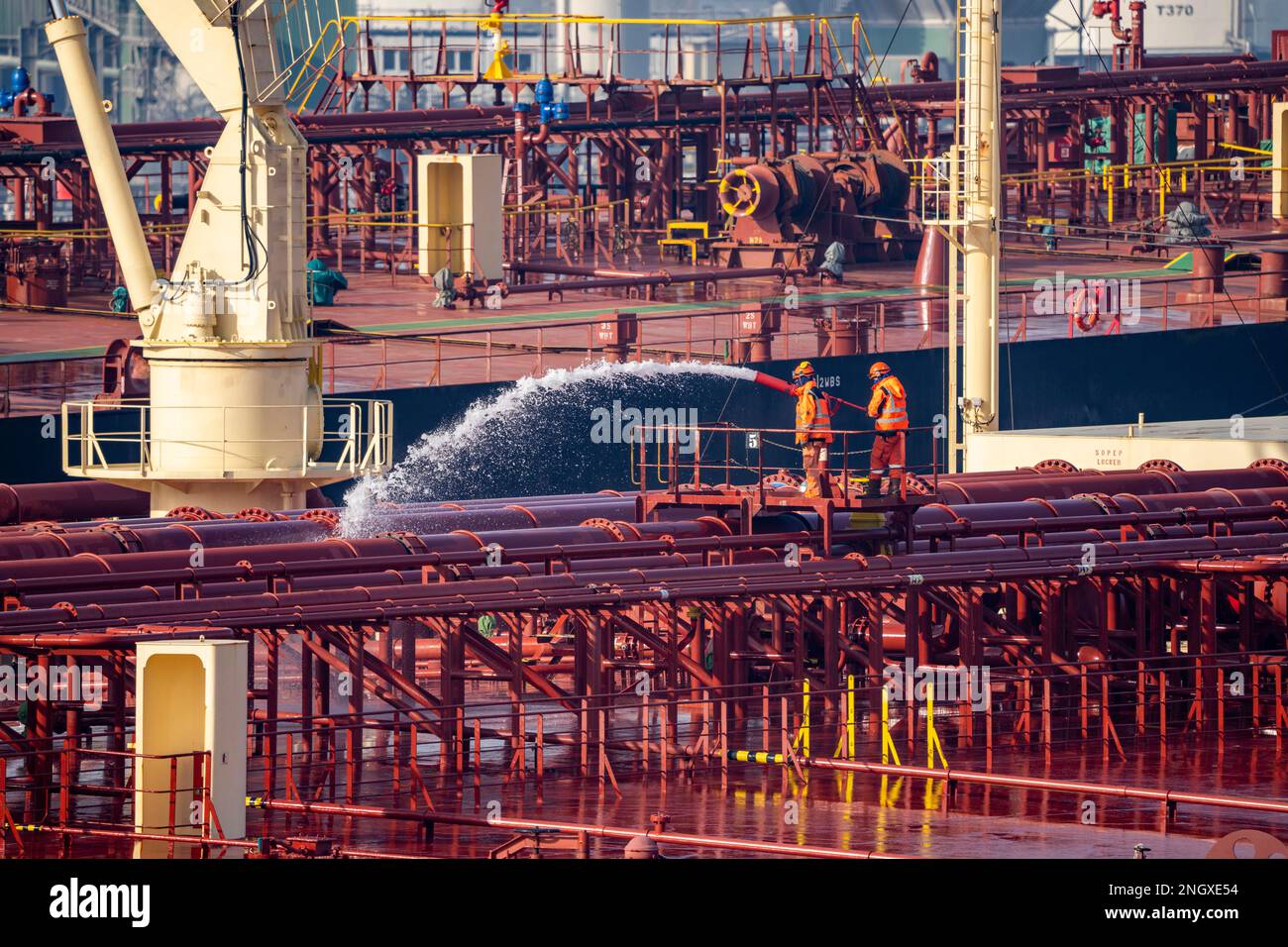 The crude oil tanker HOJO, in the seaport of Rotterdam, in the Petroleumhaven, Europoort, ship's personnel checking the fire extinguishing equipment, Stock Photo