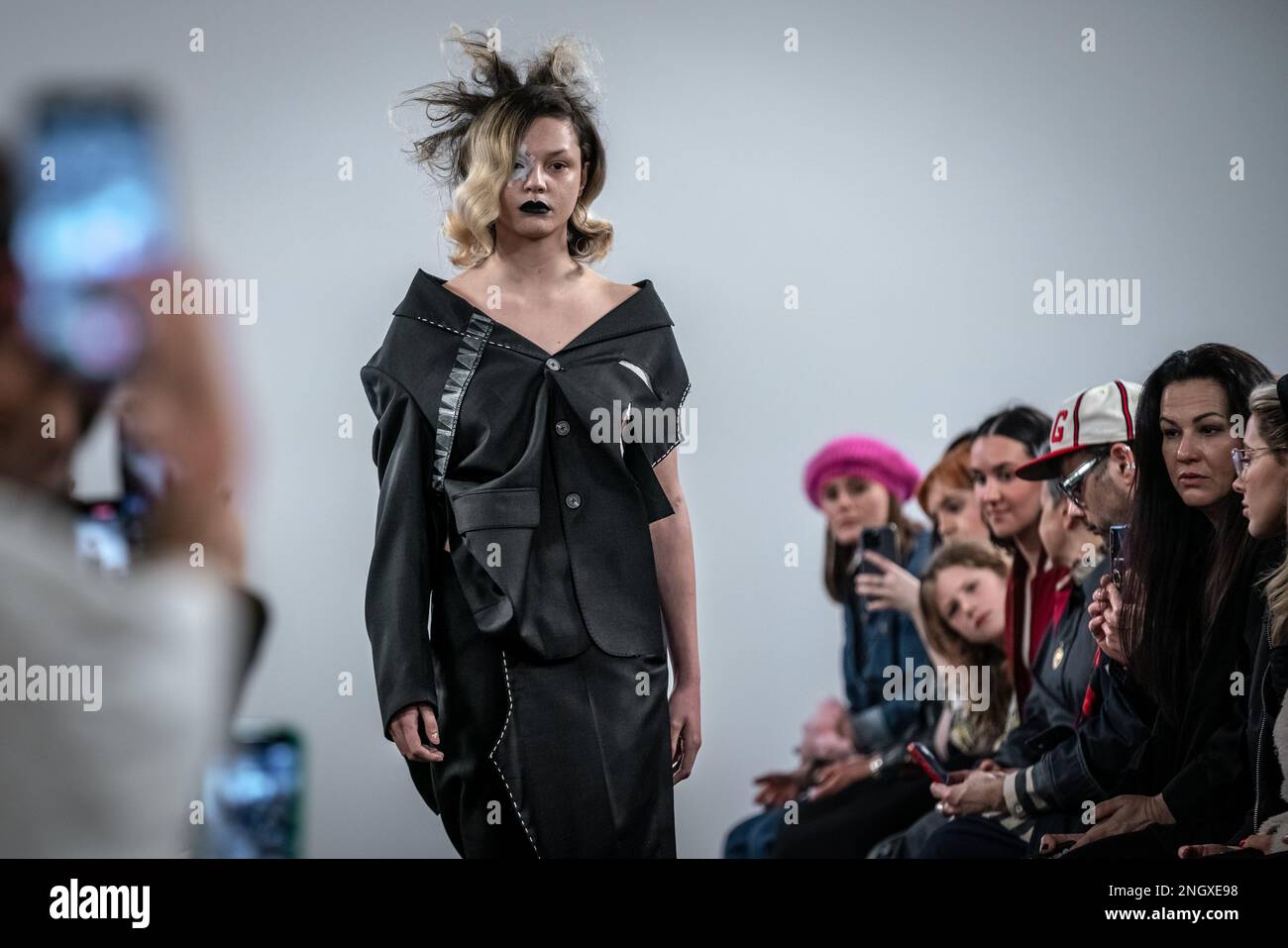 https://c8.alamy.com/comp/2NGXE98/london-uk-18th-february-2023-london-fashion-week-ia-london-presents-asymmetrix-at-protein-studios-in-shoreditch-the-runway-show-of-sustainable-ethically-produced-womenswear-holds-a-strong-artistic-brand-identity-and-is-entirely-manufactured-in-england-credit-guy-corbishleyempicsalamy-live-news-2NGXE98.jpg