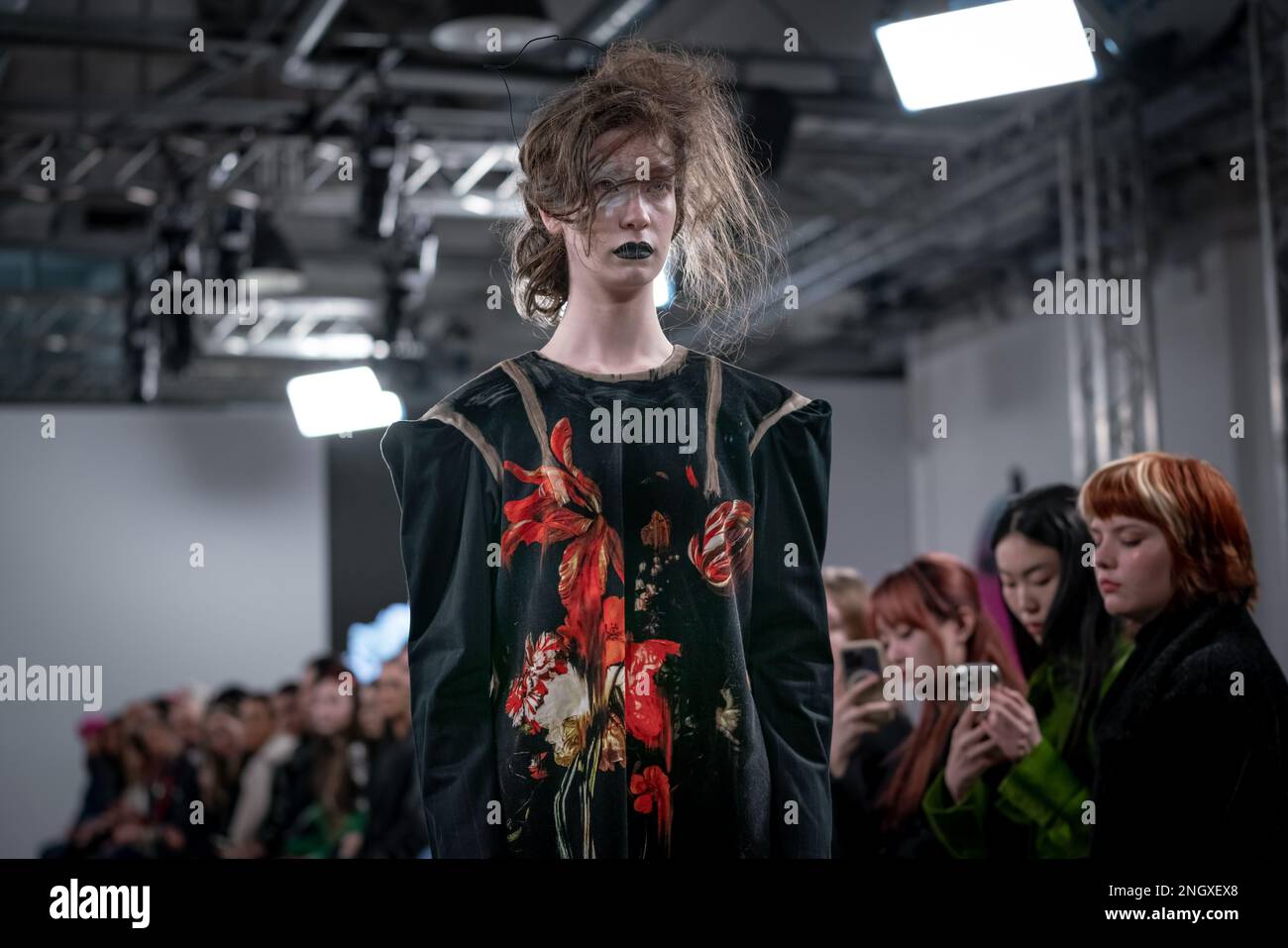 London, UK. 18th February 2023. London Fashion Week: IA London presents  'Asymmetrix' at Protein Studios in Shoreditch. The runway show of  sustainable, ethically produced womenswear holds a strong artistic brand  identity and