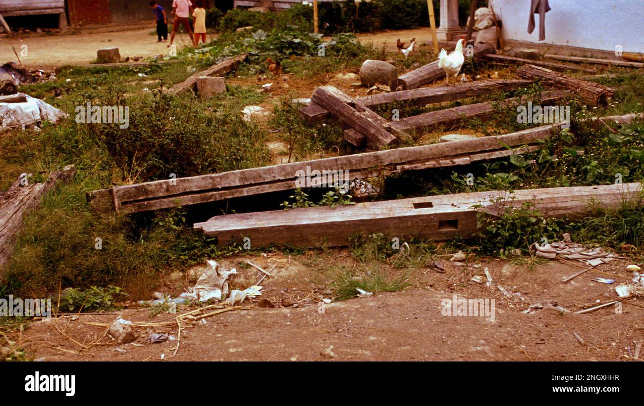 The remains of a collapsed traditional Karo Batak longhouse. Sumatra, Indonesia. Stock Photo