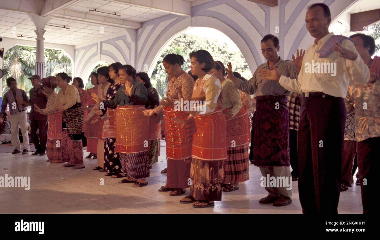 Traditional Karonese dancing at an indigenous Karo Batak wedding. Sumatra, Indonesia. Stock Photo