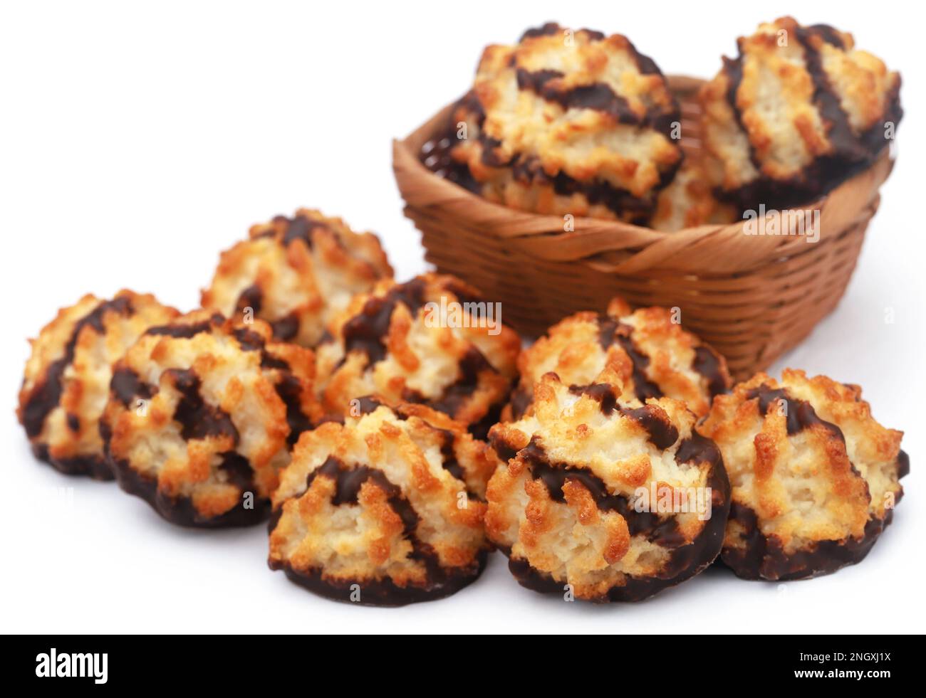 Tasty coconut chocolate cookies over white background Stock Photo
