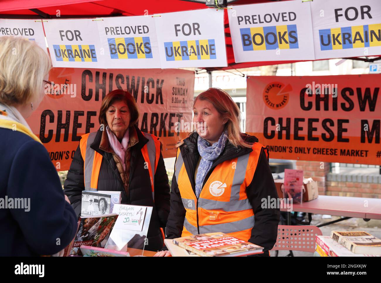 Chiswick monthly cheese market, this week with A Taste of Ukraine and Ukrainian music as the one year anniversary of the start of the Russian invasion approaches. Money was raised to support the ongoing crisis, supporting British-Ukrainan Aid and First Aid Ukraine, in west London, UK Stock Photo