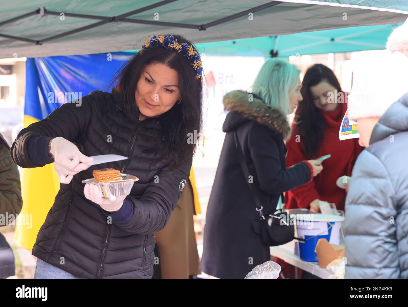 Chiswick monthly cheese market, this week with A Taste of Ukraine and Ukrainian music as the one year anniversary of the start of the Russian invasion approaches. Money was raised to support the ongoing crisis, supporting British-Ukrainan Aid and First Aid Ukraine, in west London, UK Stock Photo