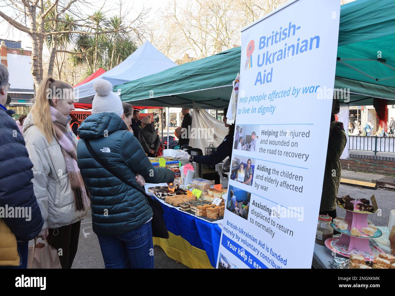 Chiswick monthly cheese market, this week with A Taste of Ukraine and Ukrainian music as the one year anniversary of the start of the Russian invasion approaches. Money was raised to support the ongoing crisis, supporting British-Ukrainan Aid and First Aid Ukraine, in west London, UK Stock Photo
