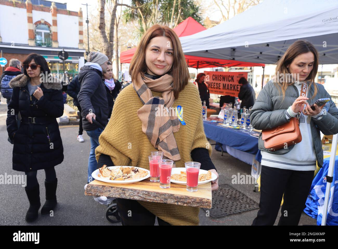 Chiswick monthly cheese market, this week with A Taste of Ukraine and Ukrainian music as the one year anniversary of the start of the Russian invasion approaches. Money was raised to support the ongoing crisis, supporting British-Ukrainan Aid and First Aid Ukraine, in west London, UK Stock Photo