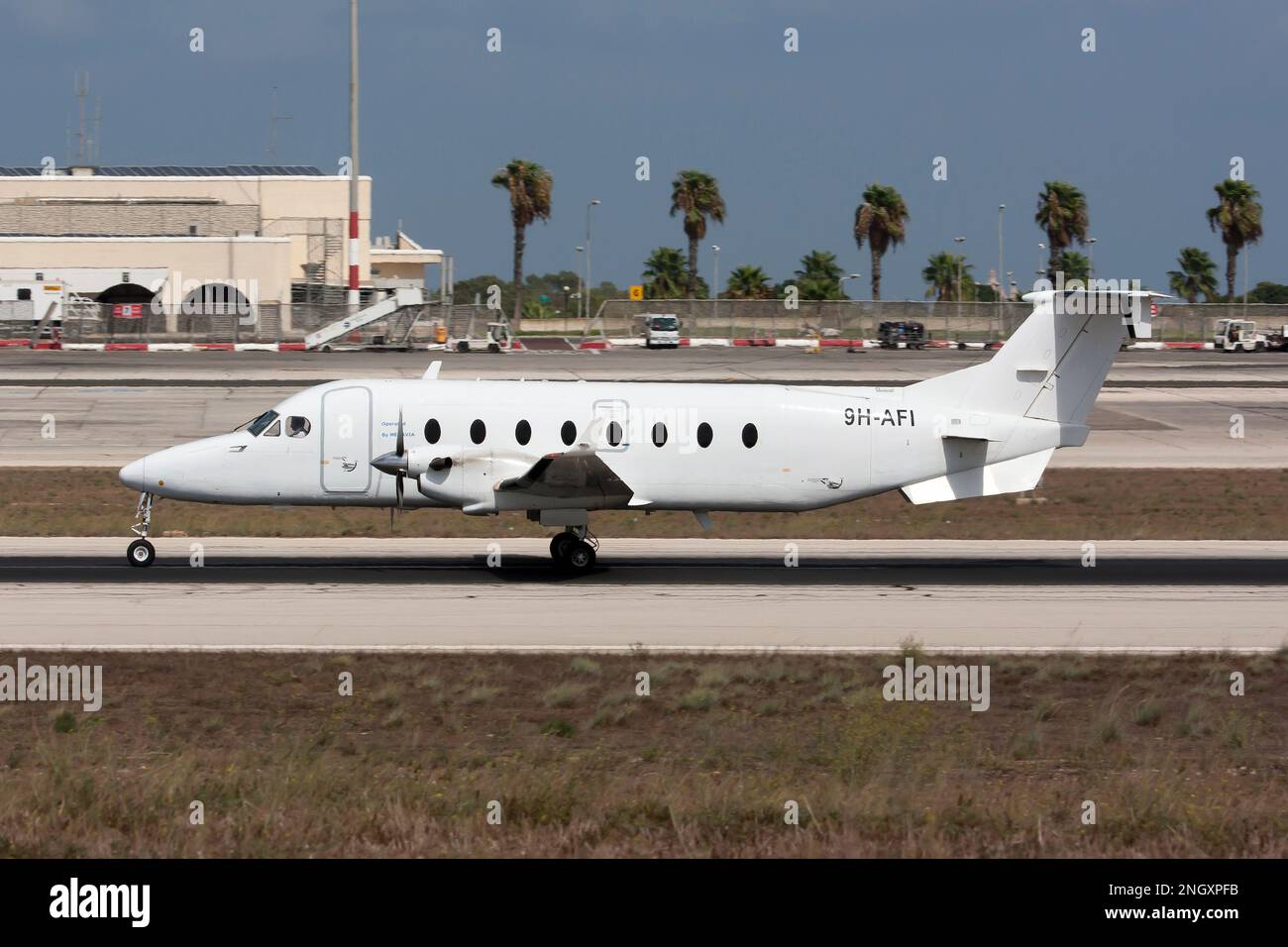 A MedAvia Beechcraft 1900D on the runway at Malta international airport. Mediterranean Aviation Company Limited, (Medavia), is an Aviation Service Provider with its head office and base of operations in Malta. Stock Photo
