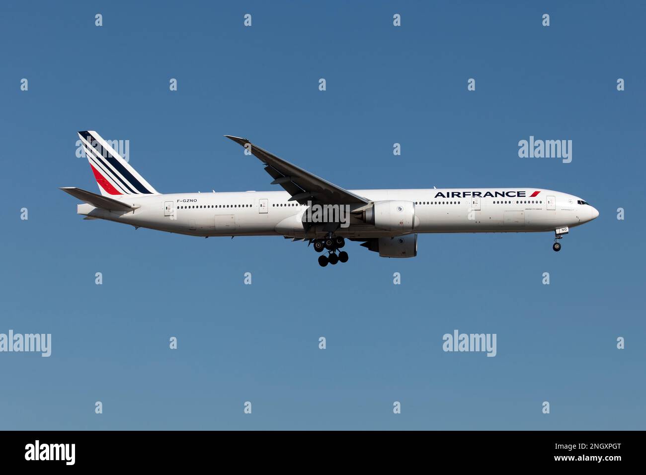 An Air France Boeing 777-300ER landing at Montreal Trudeau airport. Air Franc, is the flag carrier of France headquartered in Tremblay-en-France (Charles de Gaulle airport). It is a subsidiary of the Air France–KLM Group and a founding member of the SkyTeam global airline alliance. Stock Photo