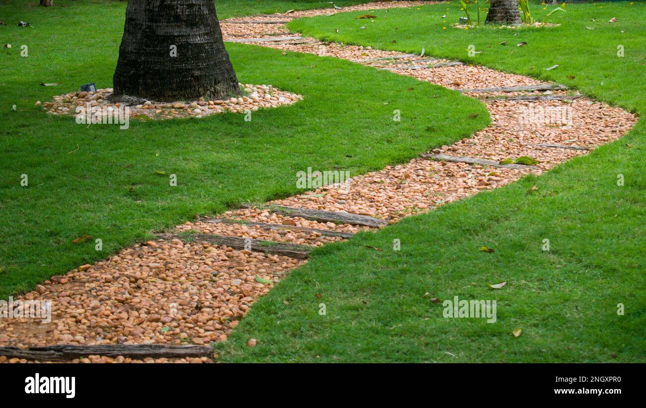 A meandering path way using pebbles in a park signifying life's journe Stock Photo