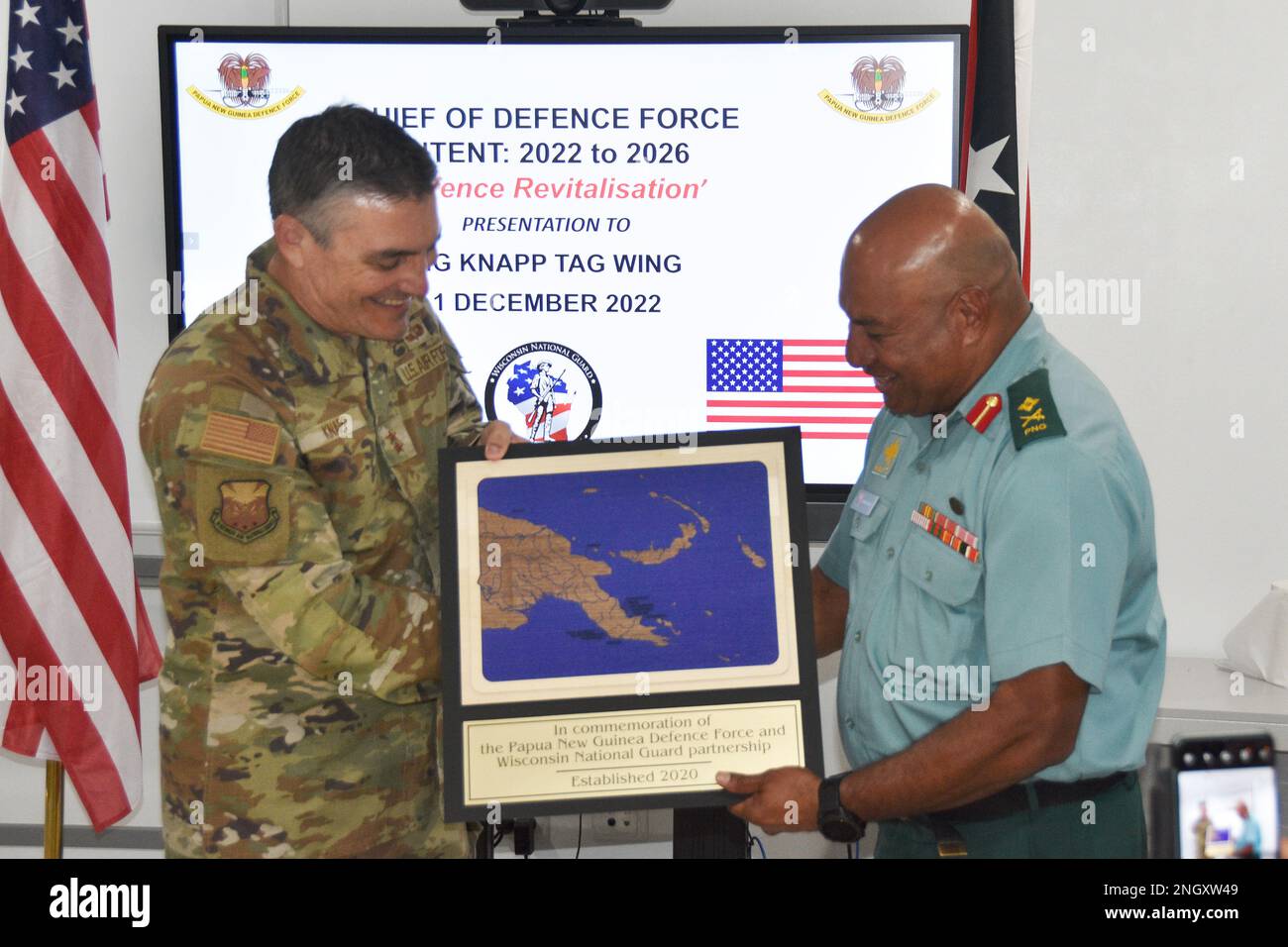 Maj. Gen. Paul Knapp, Wisconsin’s adjutant general, presents a gift