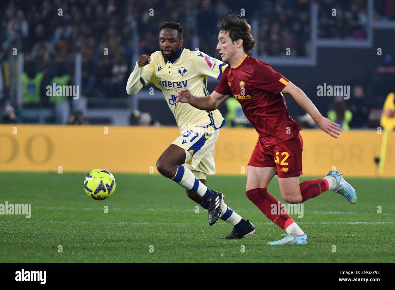 Stadio Olimpico, Rome, Italy. 19th Feb, 2023. Serie A Football; Roma versus Hellas Verona; Adrien Tamez of Hellas Verona and Edoardo Bove of AS Roma Credit: Action Plus Sports/Alamy Live News Stock Photo