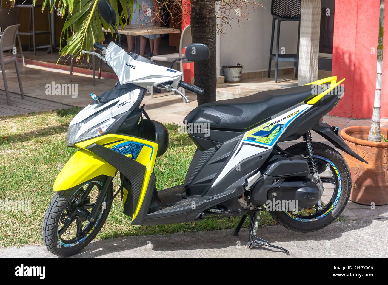Yamaha MIO i 125 moped scooter parked, Orient Bay (Baie Orientale), St Martin (Saint-Martin), Lesser Antilles, Caribbean Stock Photo