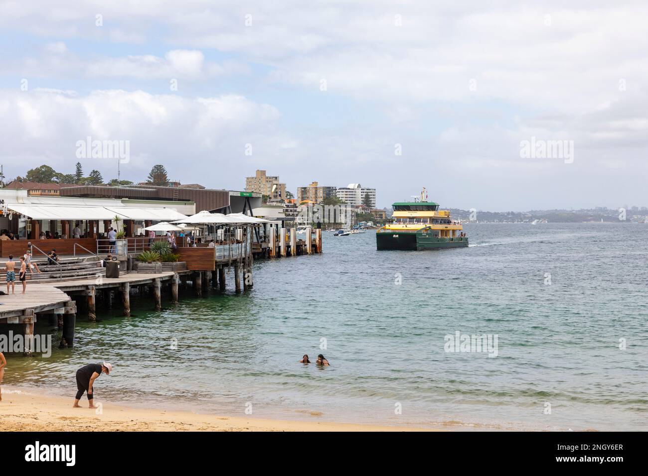 Sydney ferry Balmoral approaches Manly Beach ferry wharf on a summers