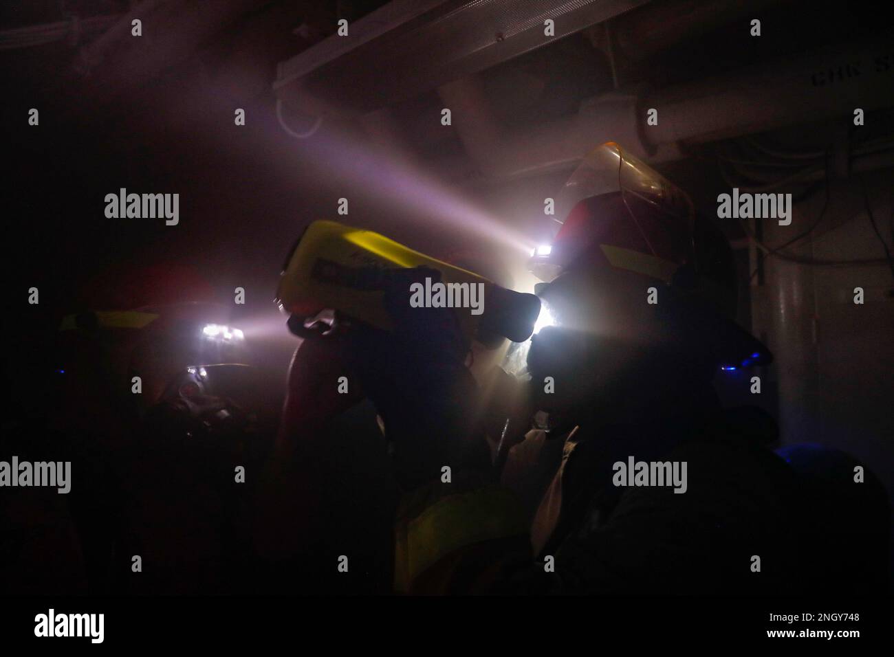 Boatswain’s Mate Seaman Brendan Bailey operates a Naval Firefighting